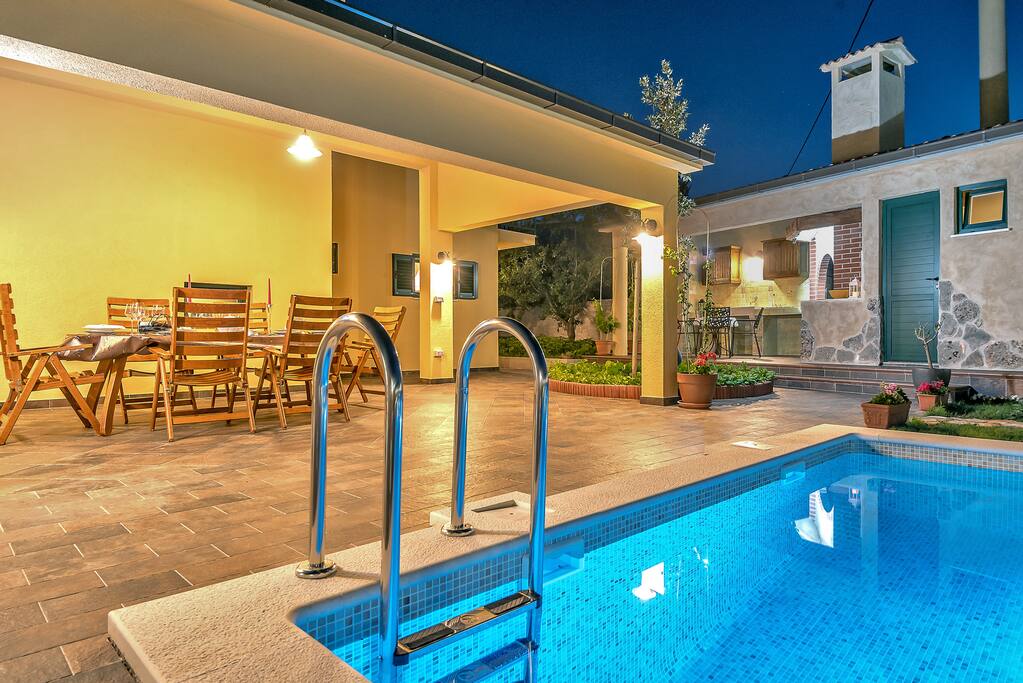 Enjoy evenings at pool and barbecue area in absolute privacy