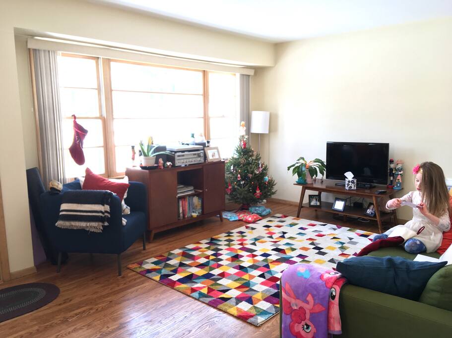 The cozy living room with super comfy queen size sleeper sofa