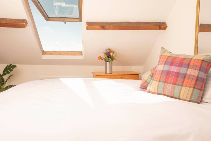 Double bed in second bedroom.