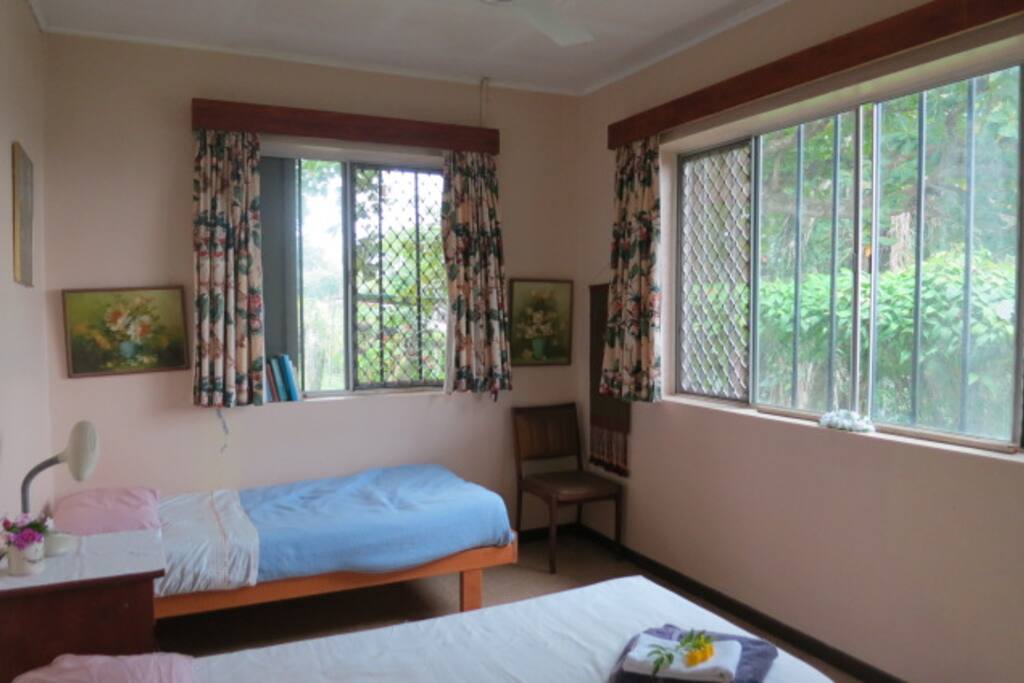 This room has fan only but a great view of the harbour & garden