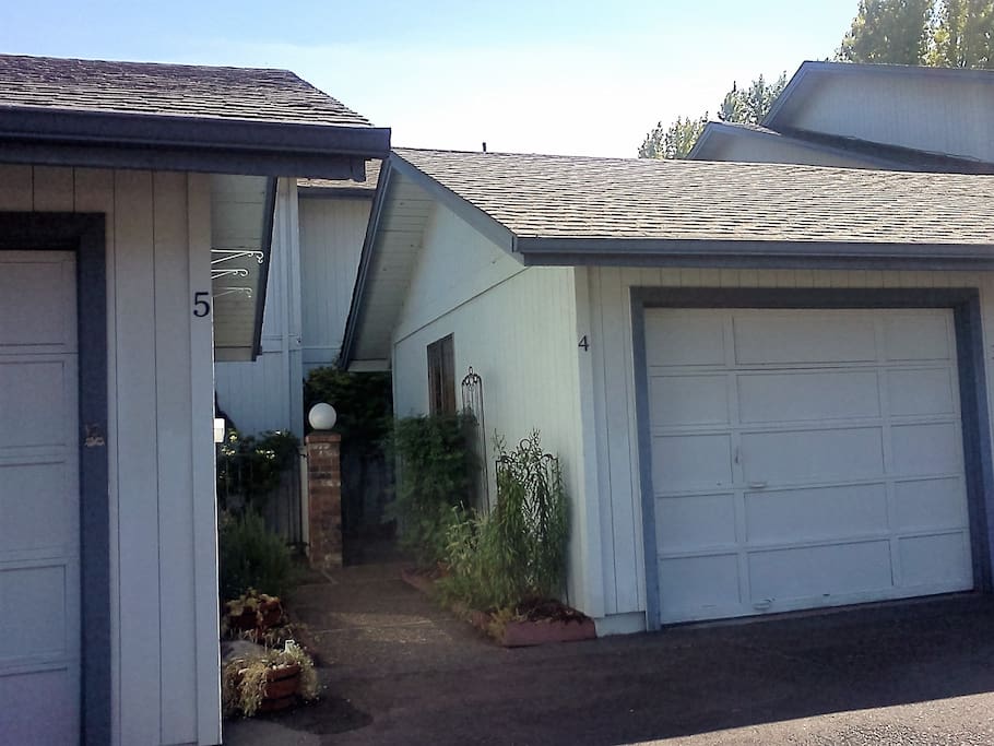 Park your car in the guest area to the left as you drive in. The parking spaces are marked "visitor." The entrance is down the walk along the garage and through the iron gate.