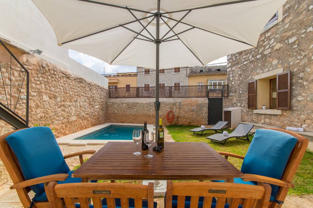 Pool area with sun beds