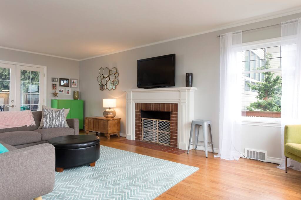 Living room with double doors that access the private back yard.