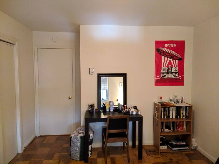 Desk for you to work on. Feel free to read any of the books found on the shelf.