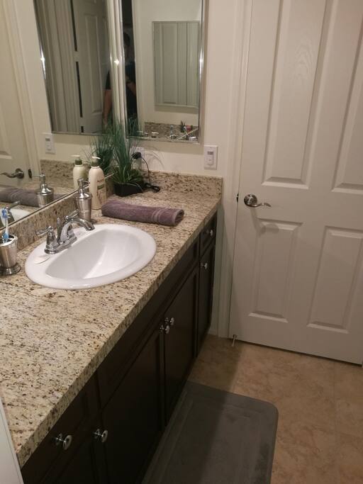 Attached restroom. (Door leads to rest of the house but well remain closed during visit)