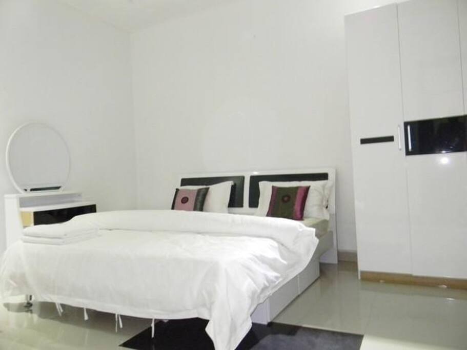 One of the beds in your private room