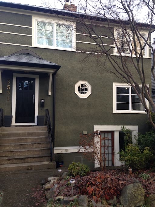 Front of the house on quiet, tree-lined street blocks to beach and shops.