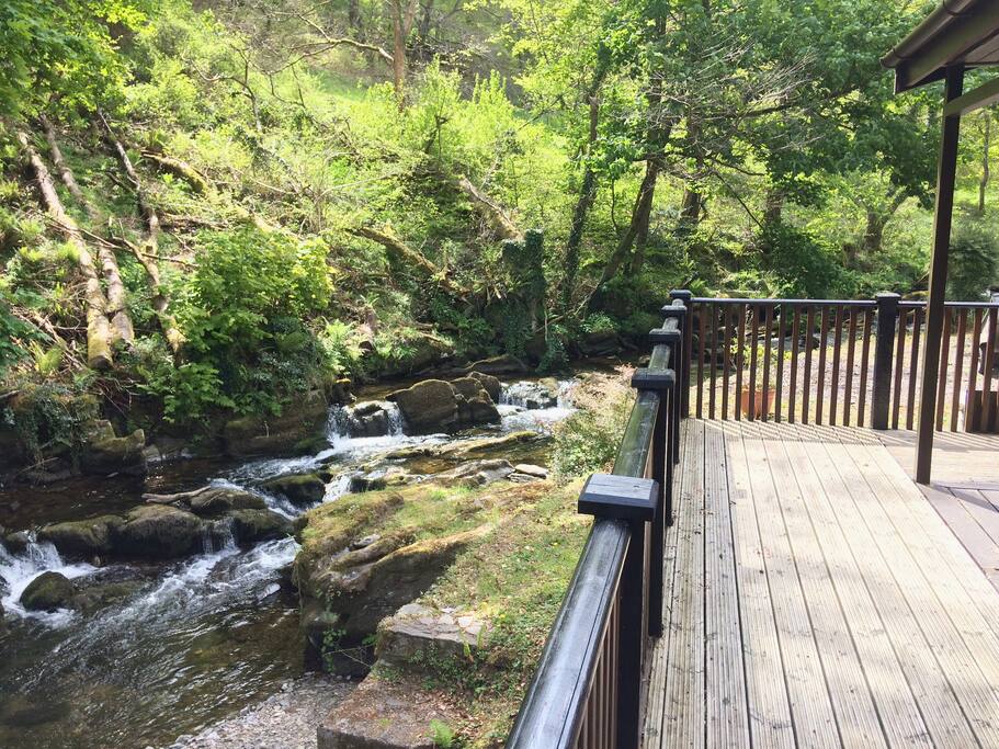 Private outside decking area overlooking the West Lyn River
