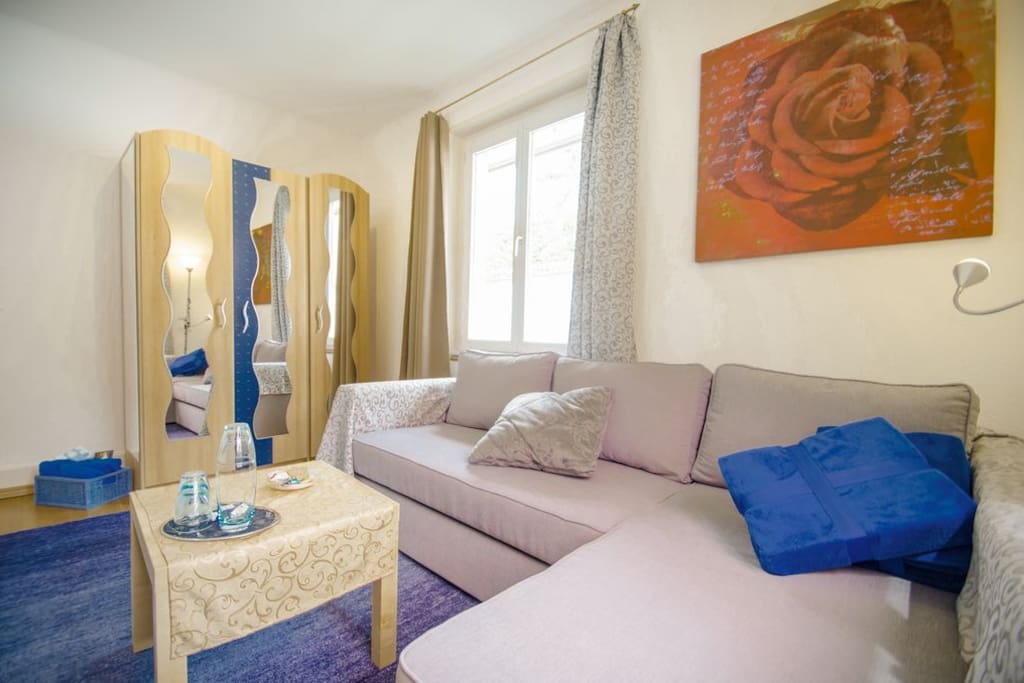 "blue dreams" cozy double bed living room with two separate beds