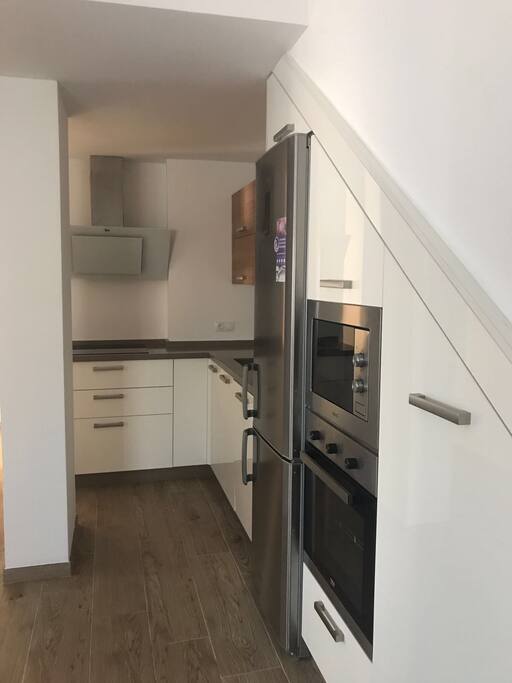 Induction cooker and cooker hood.