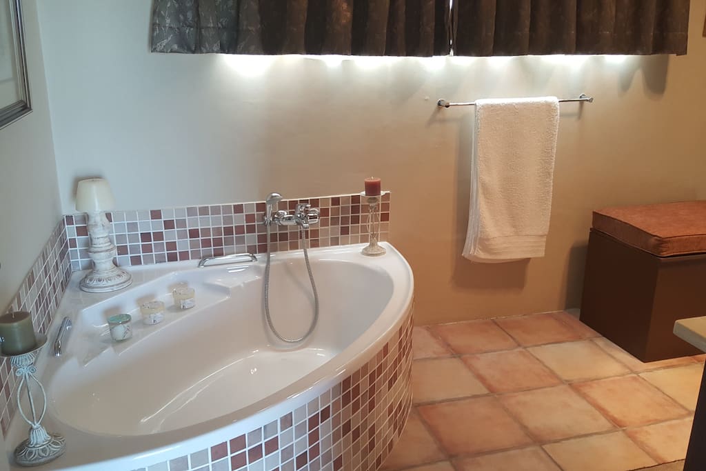 Corner baths in bathrooms