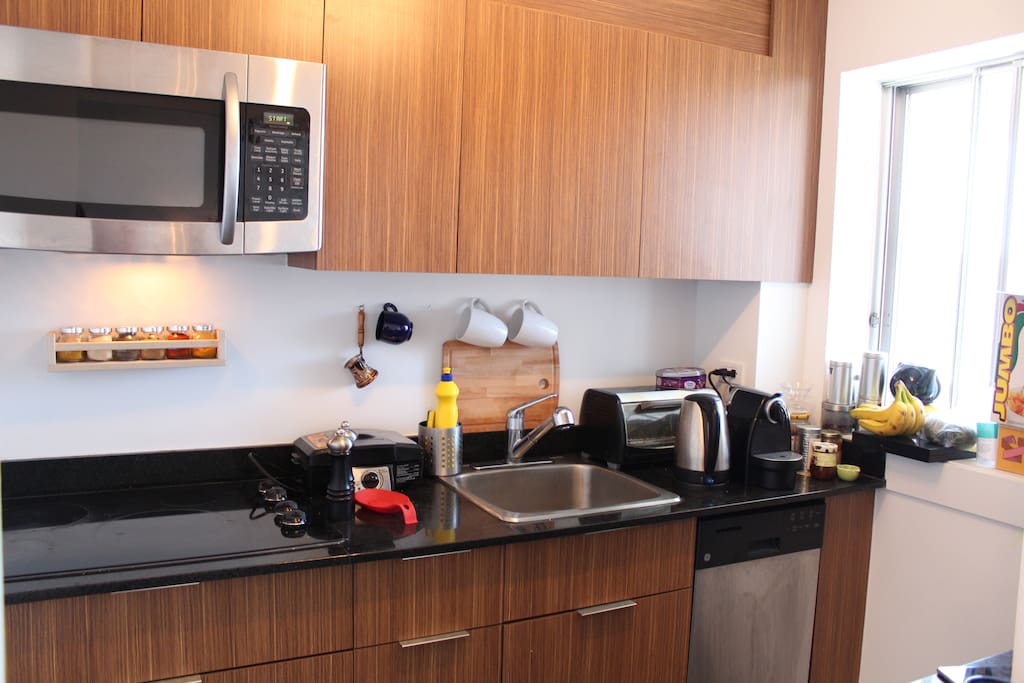 cozy kitchen with all cooking amenity which you could benefit from