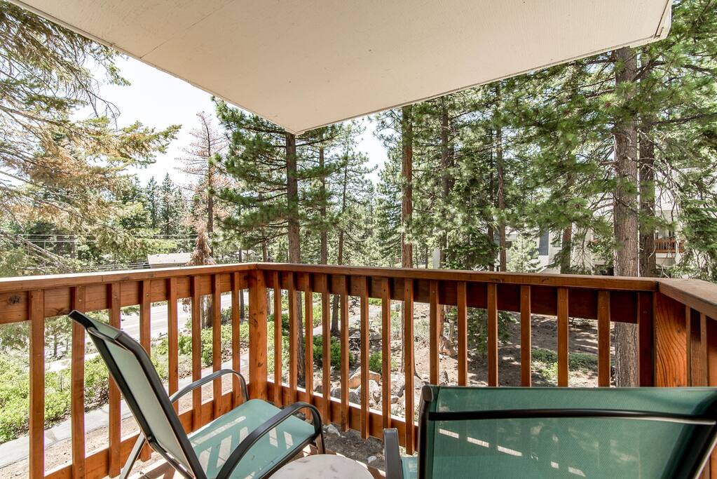 Enjoy serene wooded views from your balcony.