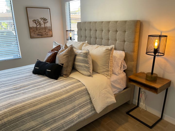 Second bedroom on the opposite end of the condo. Remote controlled mattress raiser included to prop your head up while you relax or sleep. Large walk-in closet and desk area for any work you may need to do. 