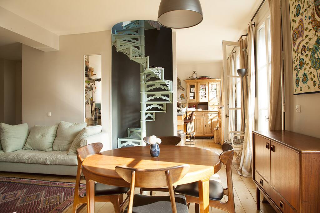 Kitchen from the living room and stairways to upstairs room