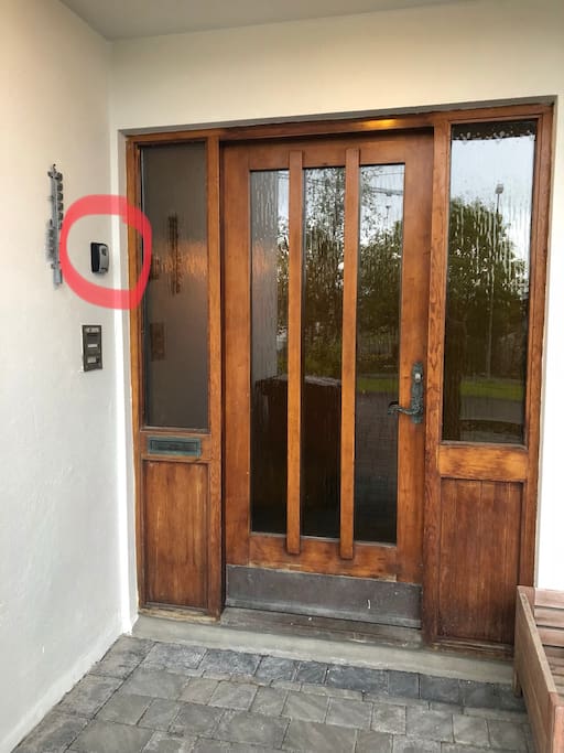 The entrance, keybox in the red circle - the left door