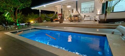 Beautiful house with heated pool - via the table