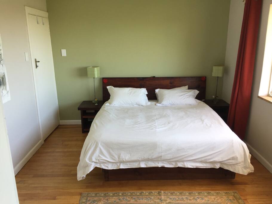 The main bedroom with its king-size bed.