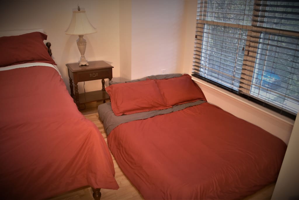Pullout futon double bed under bed.