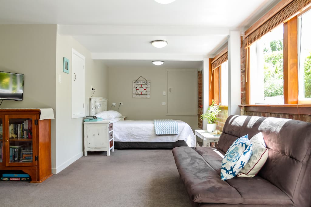Open plan studio with Queen size bed and double sofa bed