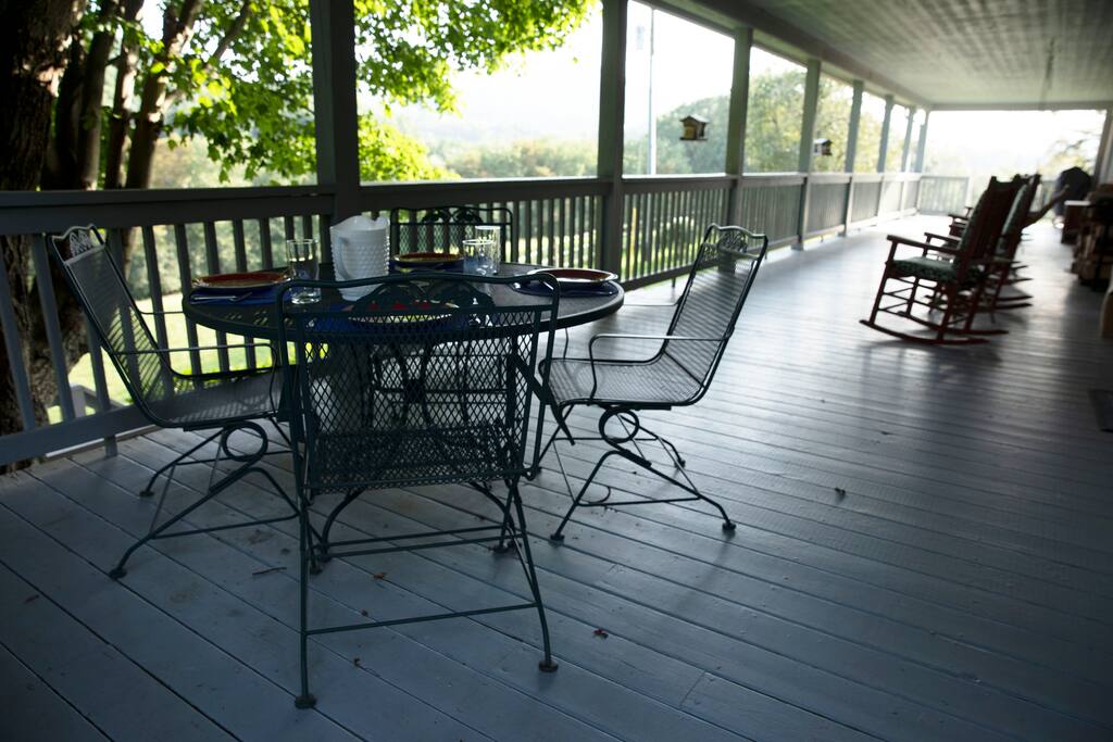 From the big porch, you can view the Blue Ridge Parkway and Green Mountain.
It is a perfect place for outdoor dining, a morning cup of coffee, reading and relaxing in the rocking chairs, bird watching, or enjoying mountain sunrises and sunsets.