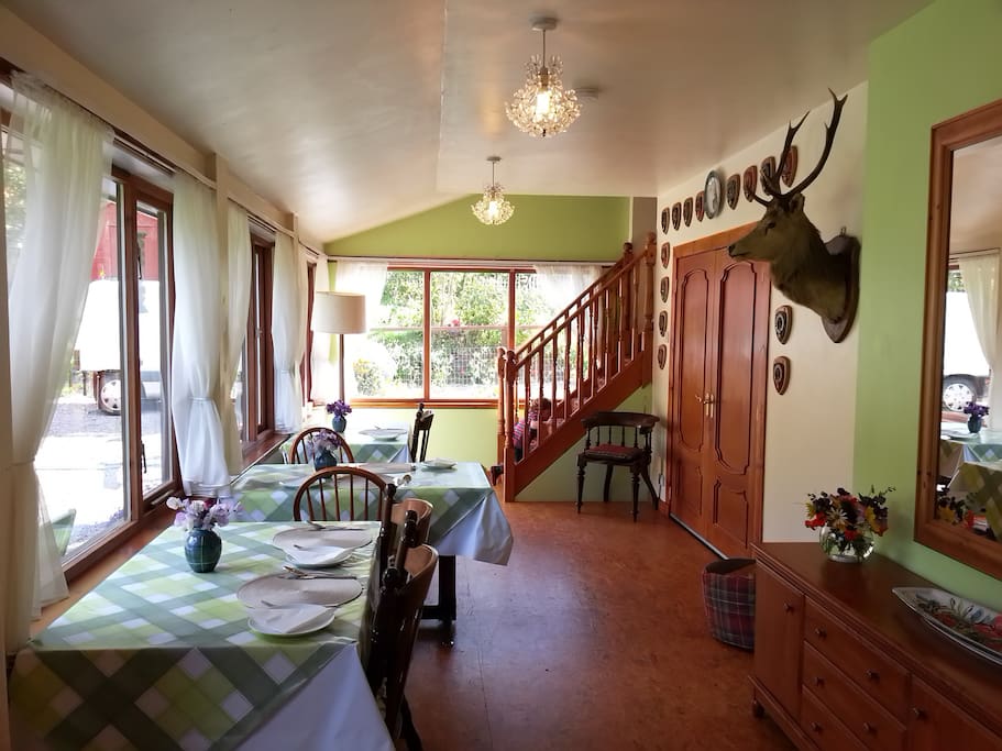 Our large bright dining area with adjoined kitchenette looking out to the garden