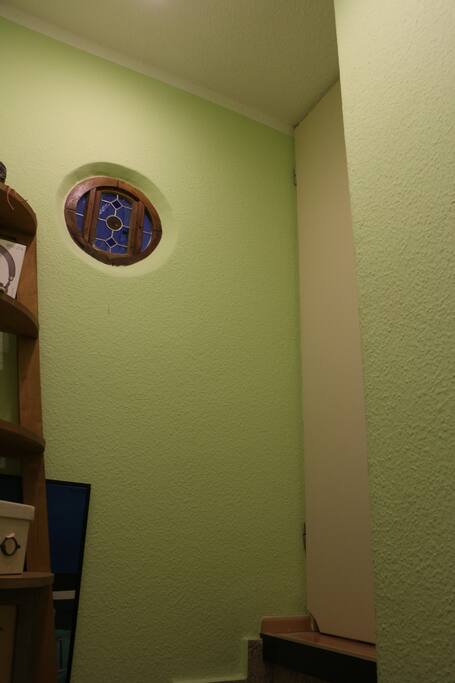 Door to the seperate private floor with own bathroom and desk.