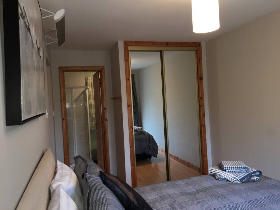 Bedroom leading to shower room
