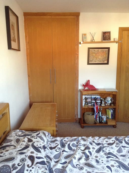 Large wardrobe with lots of hanging space.