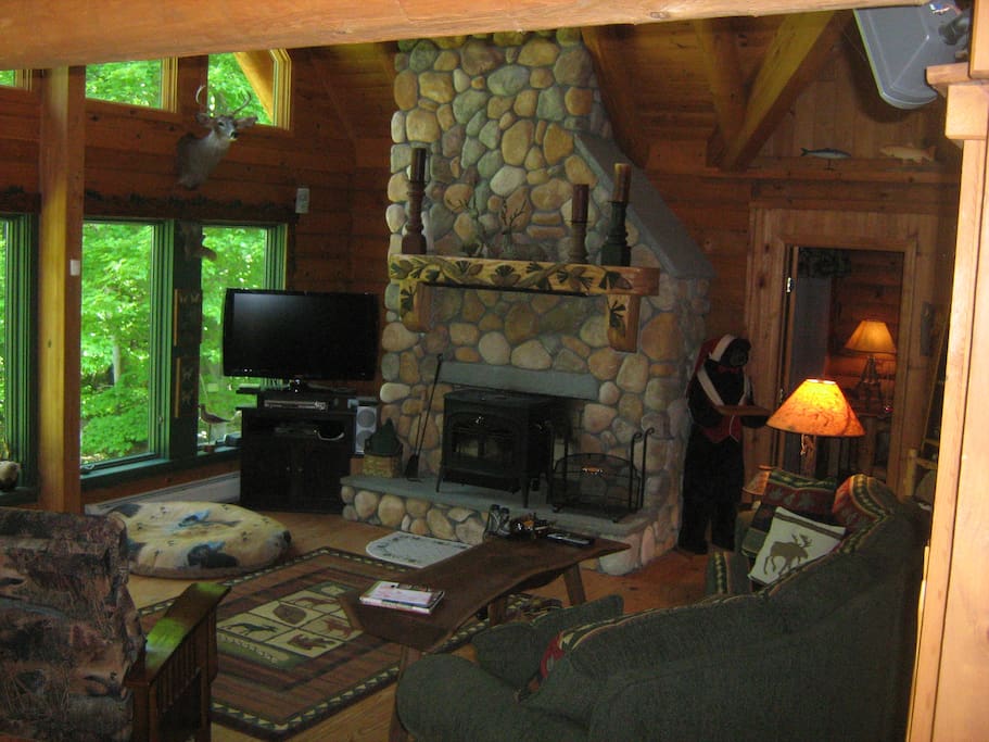 Family room hearth and wall of windows