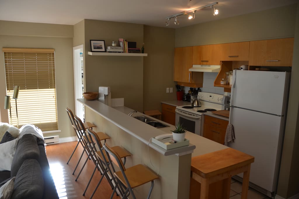 Exposed, fully stoked kitchen. Great for entertaining.