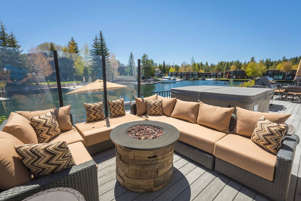 Gather round the fire pit, as there's plenty of comfortable seating for everyone.