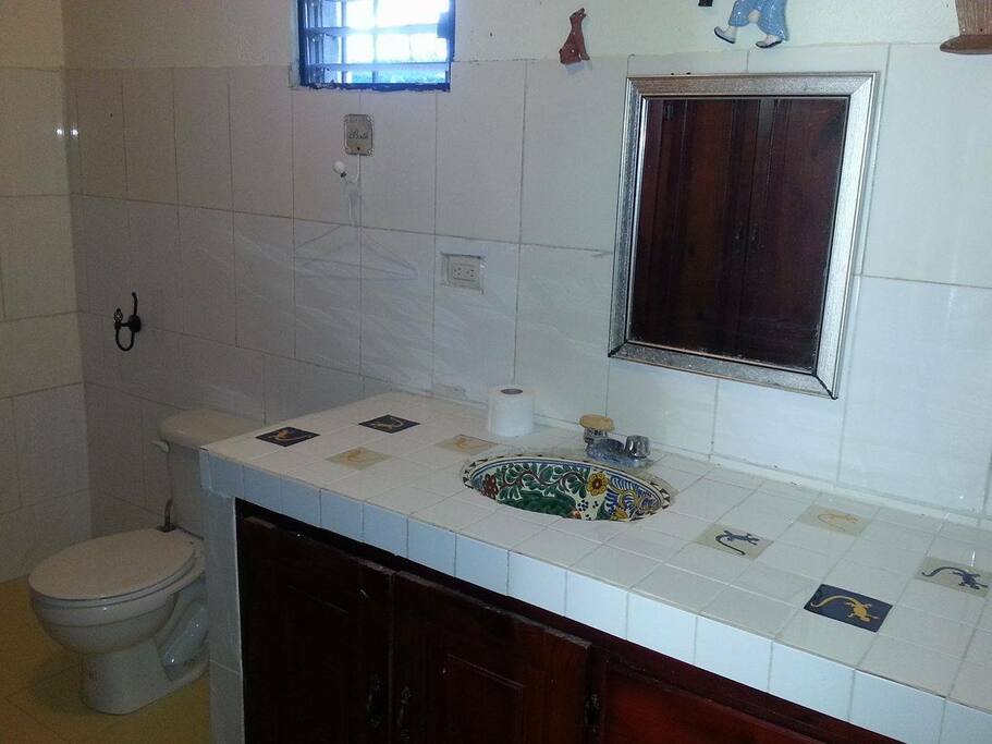Large bathroom with shower and solar hot water