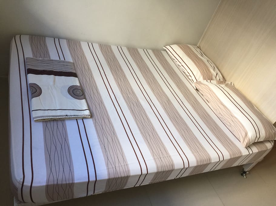 Double size bed with clean beddings