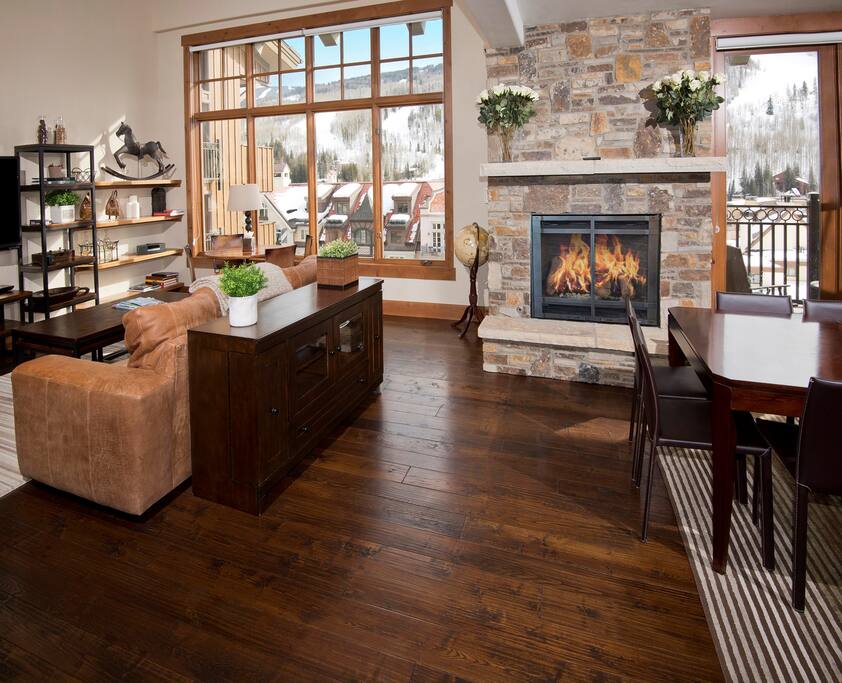 Take a seat in the comfortable living area and warm up in front of the fireplace.