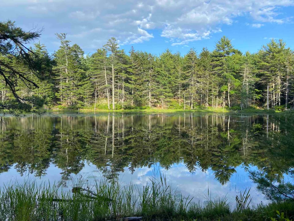 A log cabin on a small pond near Reid State Park, Georgetown, Maine, United States, photo 1 of 10