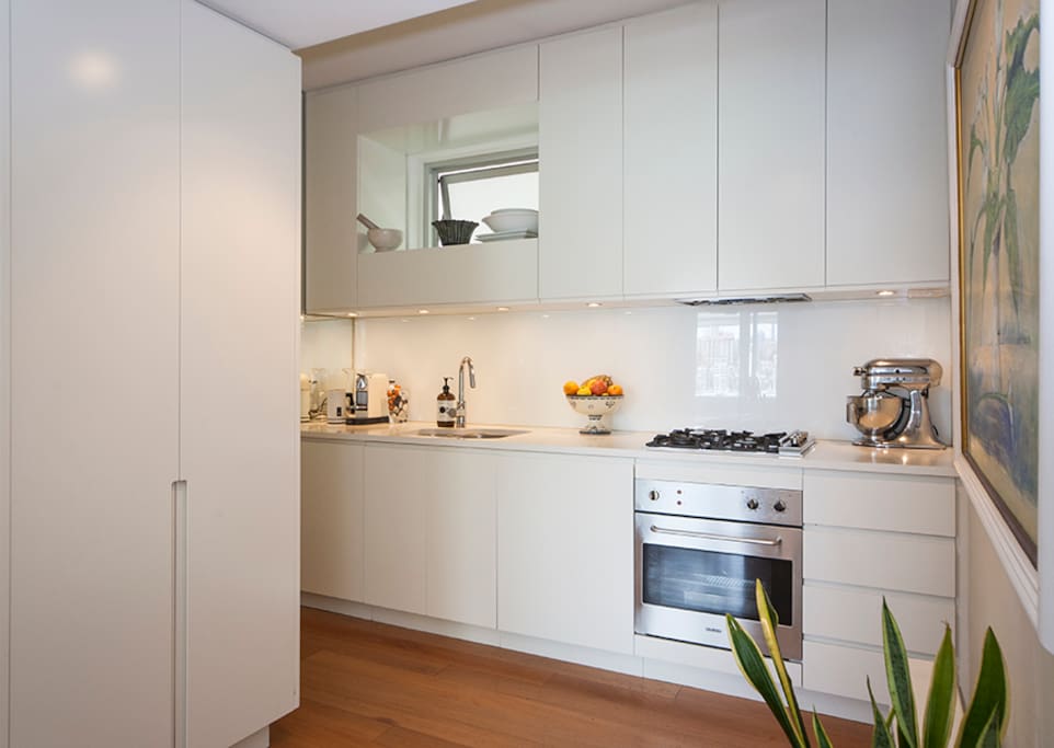Modern kitchen with most appliances