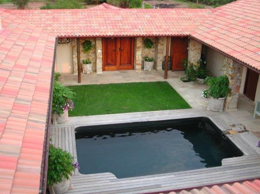 Upper terrace view of Courtyard with pool