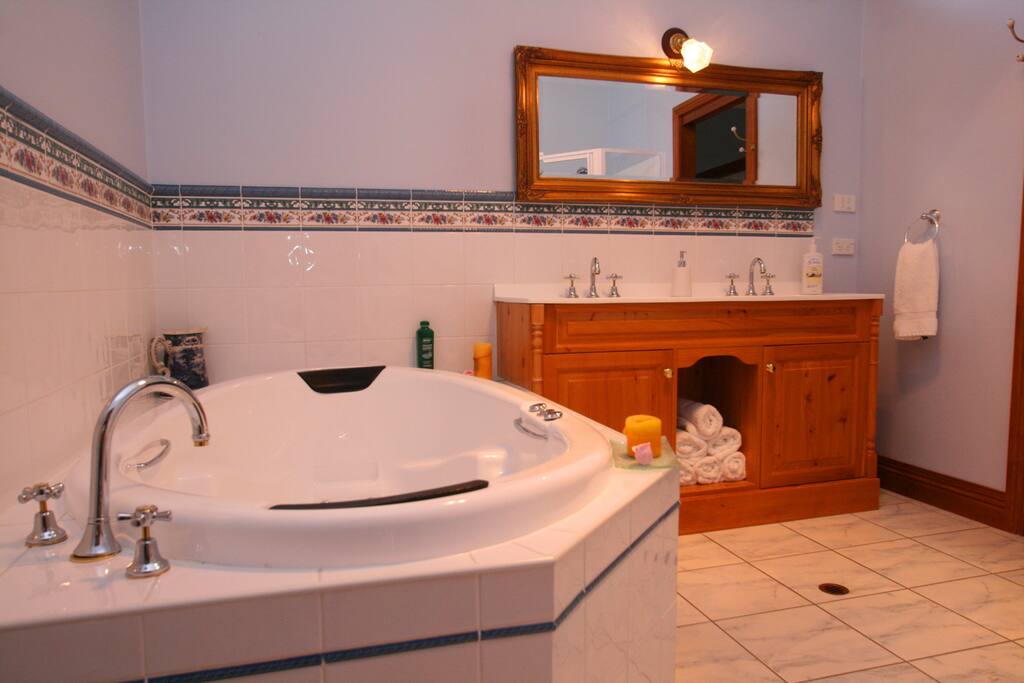 Spa bathroom with separate walk in shower