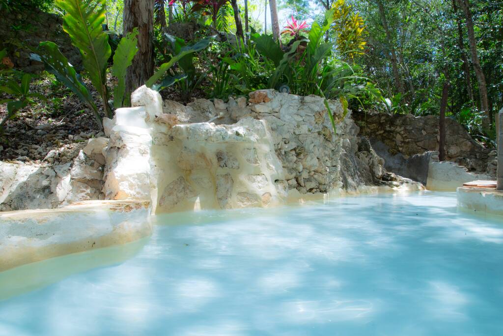 Your fantastic soaking pool and waterfall.