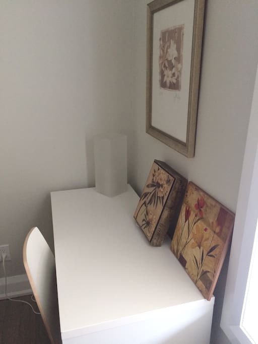 Comfortable desk with wireless and wired internet access.