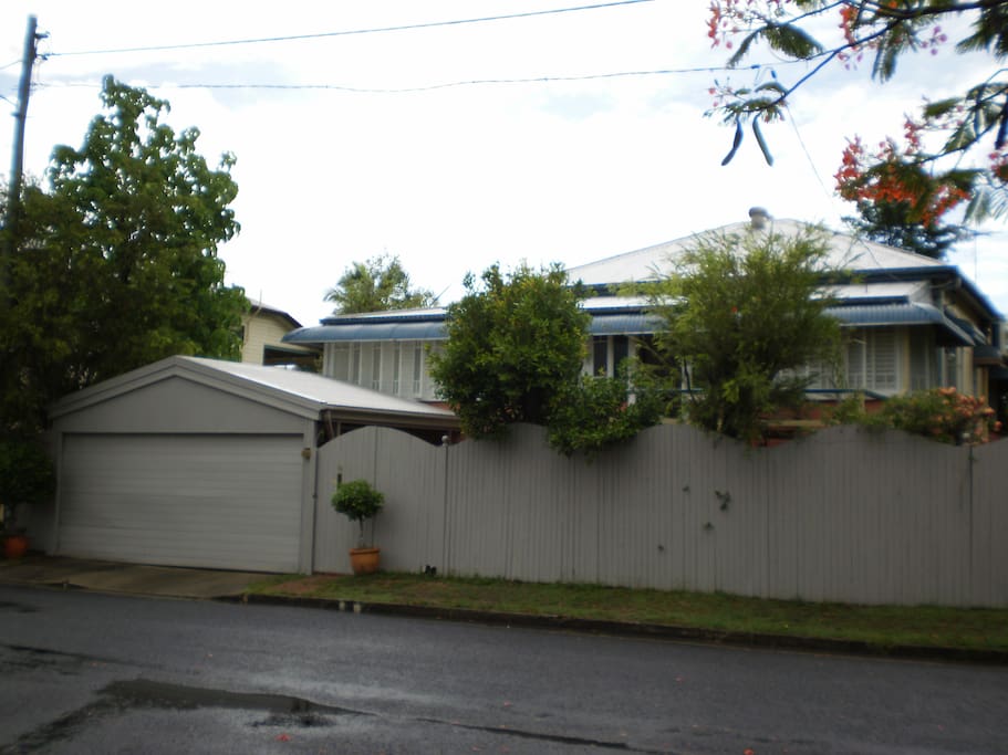 Street view with double garage & fully fenced for privacy