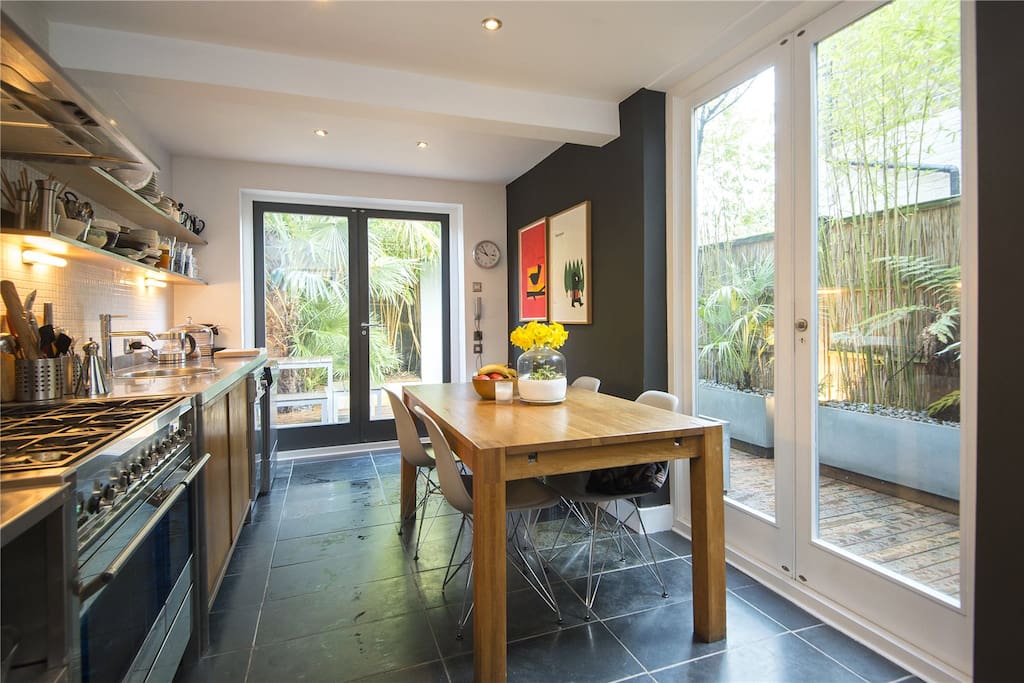 The very well equipped kitchen, which opens on to the garden.