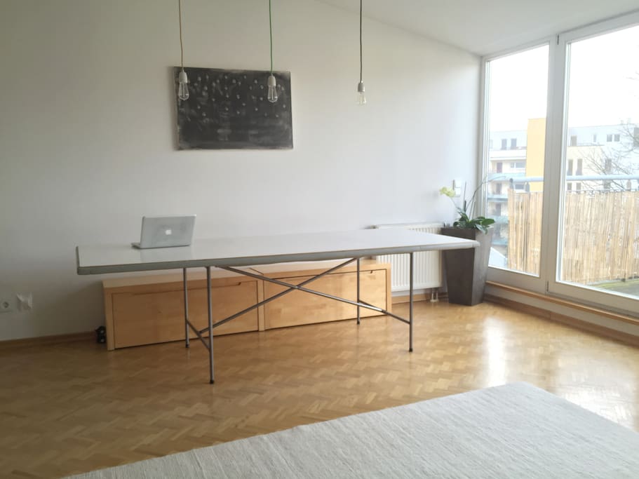 Living Room with a large dining /work table.