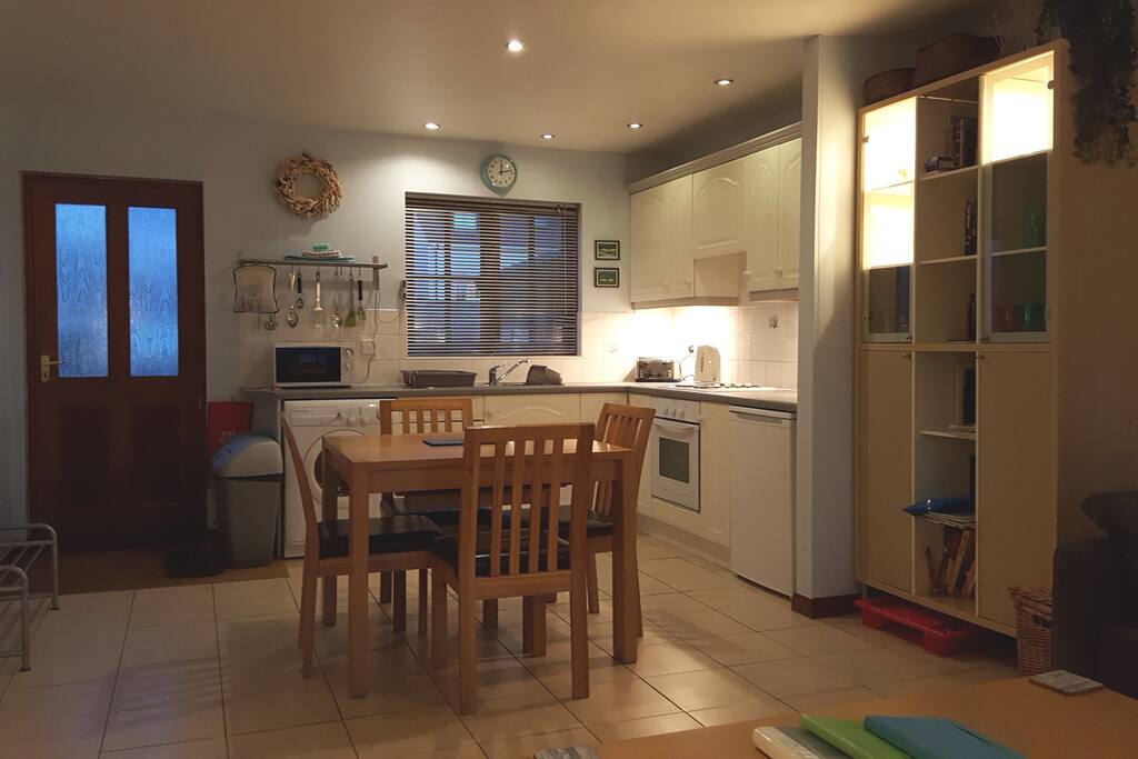 Open plan kitchen and dining area.