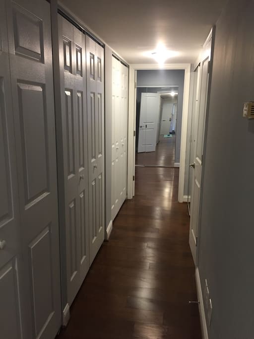 hall way with a lot of storage spaces