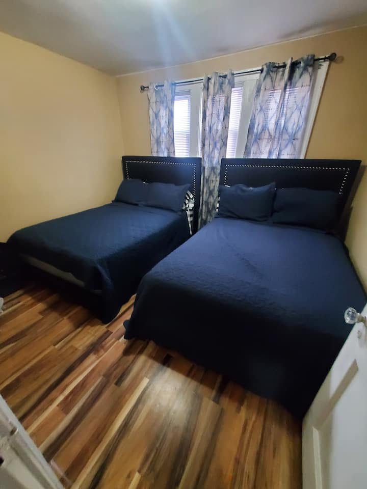 Two comfortable fullsize beds located on second floor of home.