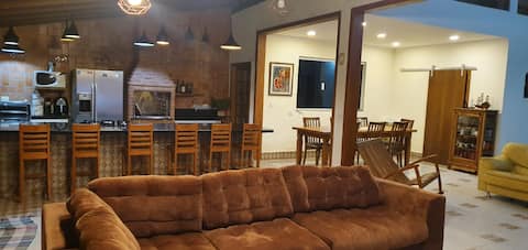 Top performing Airbnb: Casa Bertioga+20 guests 7 suites air conditioning 400 meters from the beach in Bertioga