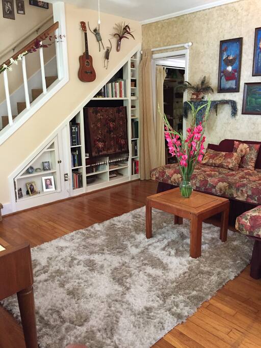 Seated at dining room table, LR door to hallway to bath and Patio Bedroom