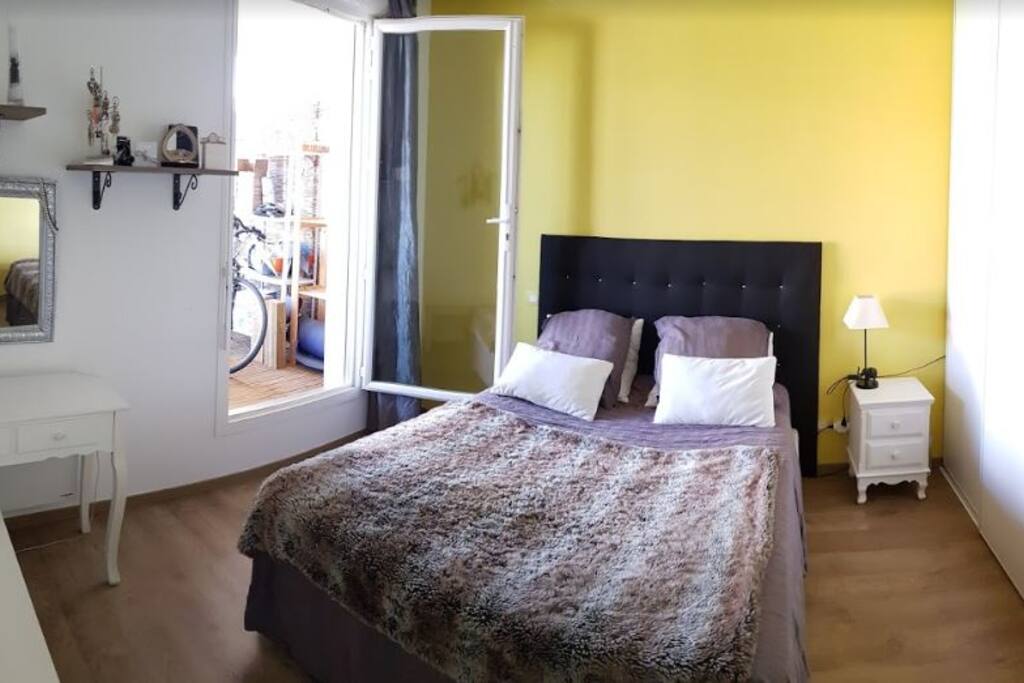 Chambre parentale avec accès à une terrasse privée de 15m²